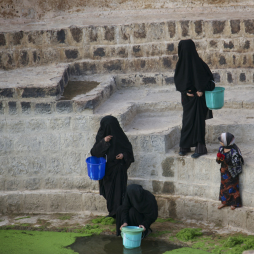 Women Taking Water From A Cistern Covered By Lentils, Shahara, Yemen