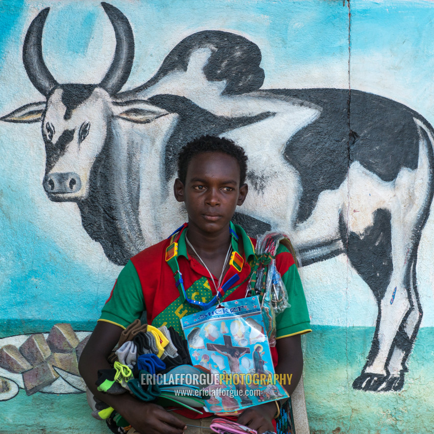 ERIC LAFFORGUE PHOTOGRAPHY - Ethiopian teenage boy in front of a mural ...