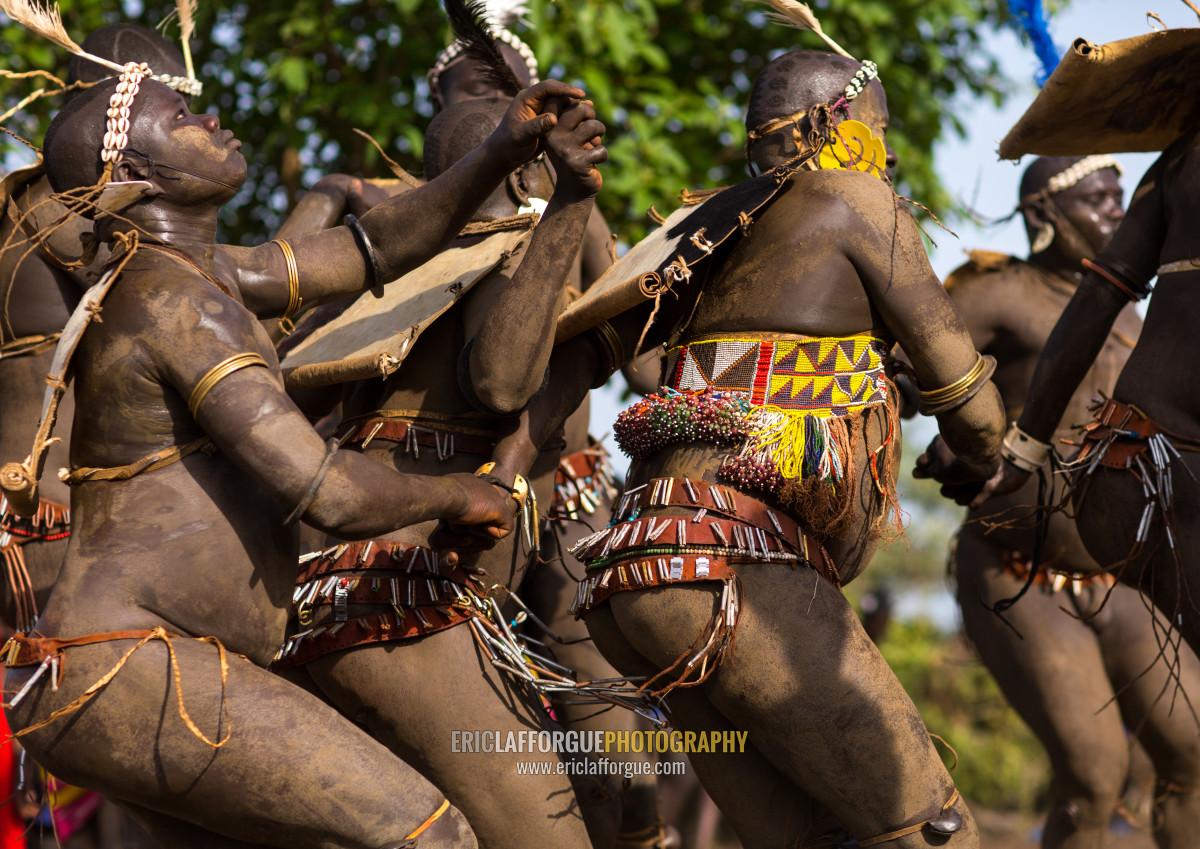 Bodi tribe fat men dancing during Kael ceremony, Omo valley, Hana Mursi, Et...