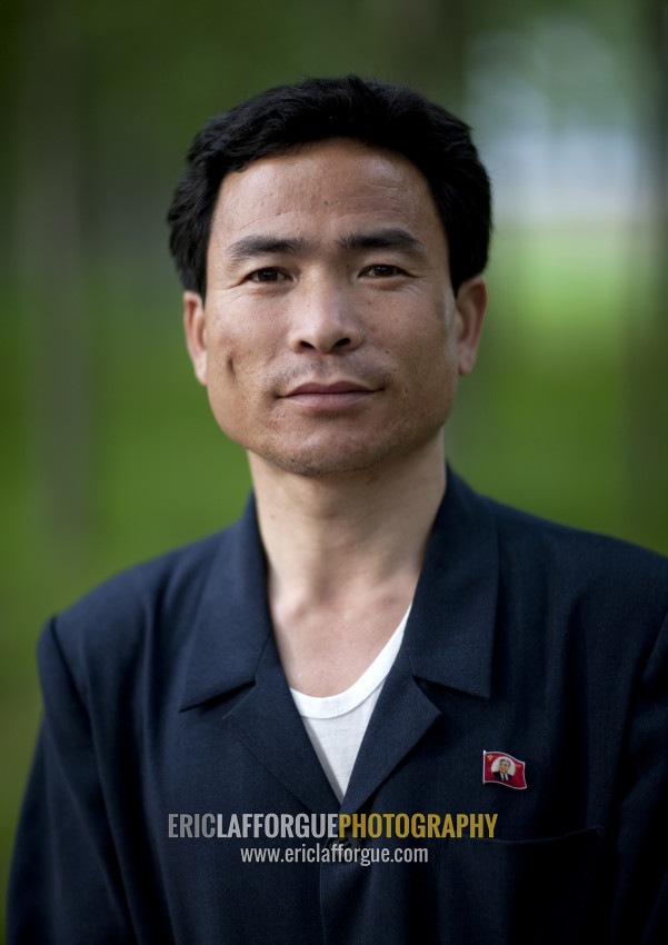 ERIC LAFFORGUE PHOTOGRAPHY - North Korean man with a workers' Party of ...