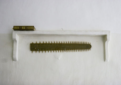 Quran and rostrum on a wall, Amanat Al-Asemah, Sanaa, Yemen