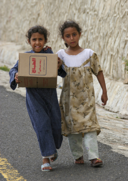 Portrait of two yemeni girls in the street, Janad Region, Taiz, Yemen