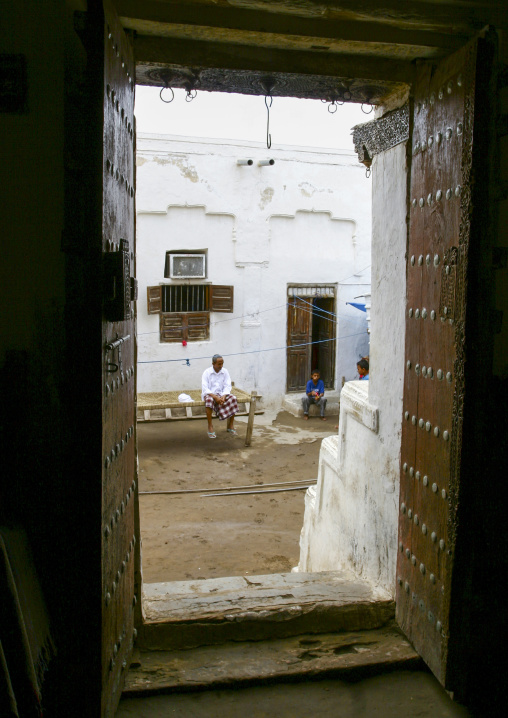 Yemeni family in an heritage house courtyard, Al Hudaydah Governorate, Zabid, Yemen