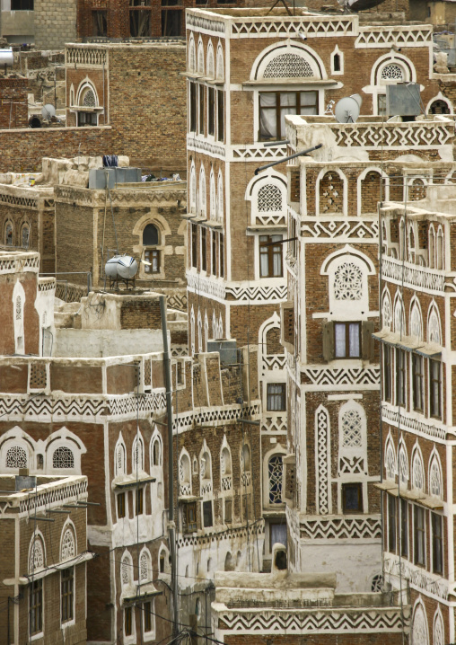 Traditional houses in the old city featuring ornamental facades, Amanat Al-Asemah, Sanaa, Yemen