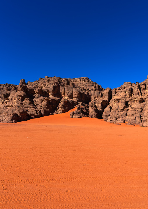 Rocks and sand dunes in Sahara desert, Tassili N'Ajjer National Park, Tadrart Rouge, Algeria