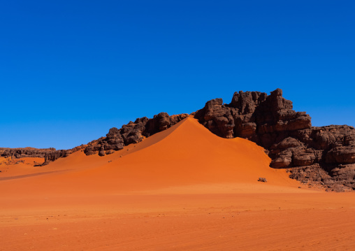 Rocks and sand dunes in Sahara desert, Tassili N'Ajjer National Park, Tadrart Rouge, Algeria