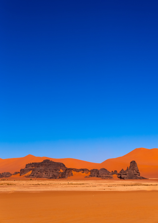 Rocks and sand dunes in Sahara desert, Tassili N'Ajjer National Park, Tadrart Rouge, Algeria