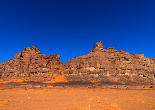 Rocks and sand dunes in Sahara desert, Tassili N'Ajjer National Park, Tadrart Rouge, Algeria