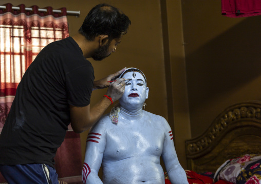 Make up of a hindu devotee who becomes Lord Shiva at Lal Kach festival, Dhaka Division, Munshiganj, Bangladesh