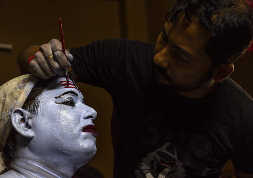 Make up of a hindu devotee who becomes Lord Shiva at Lal Kach festival, Dhaka Division, Munshiganj, Bangladesh