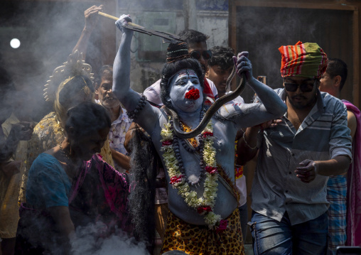 Lord Shiva procession with devotees at Lal Kach festival, Dhaka Division, Munshiganj, Bangladesh