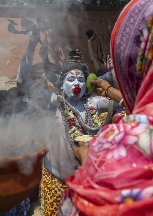 Lord Shiva procession with devotees at Lal Kach festival, Dhaka Division, Munshiganj, Bangladesh