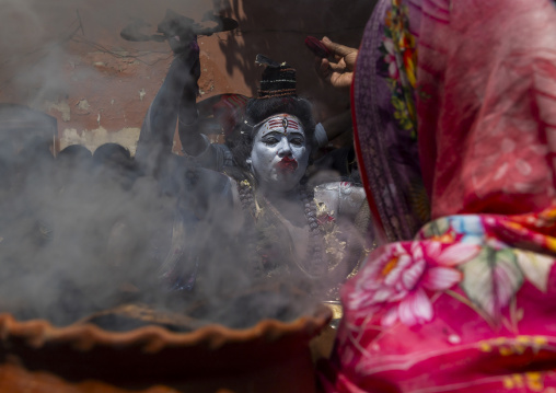 Lord Shiva procession with devotees at Lal Kach festival, Dhaka Division, Munshiganj, Bangladesh