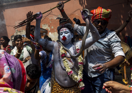 Lord Shiva procession with devotees at Lal Kach festival, Dhaka Division, Munshiganj, Bangladesh