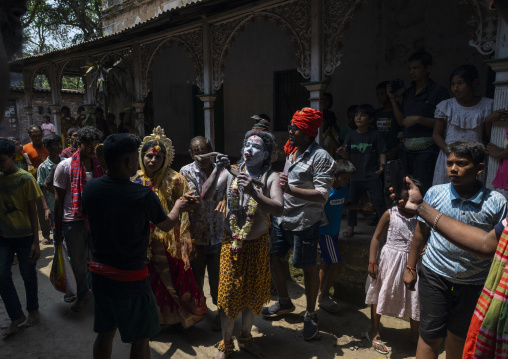 Lord Shiva with a snake during a procession at Lal Kach festival, Dhaka Division, Munshiganj, Bangladesh