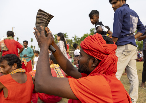 Devotee with a horn during Charak Puja hindu festival, Sylhet Division, Kamalganj, Bangladesh
