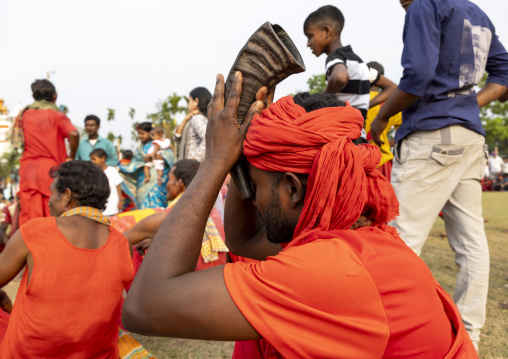 Devotee with a horn during Charak Puja hindu festival, Sylhet Division, Kamalganj, Bangladesh