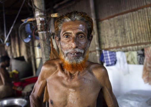 Bangladeshi man working in a batik factory, Chittagong Division, Comilla, Bangladesh