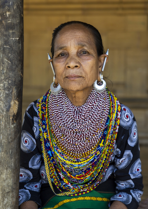 Portrait of a Tripura tribe woman with traditional necklaces and earrings, Chittagong Division, Rowangchhari, Bangladesh