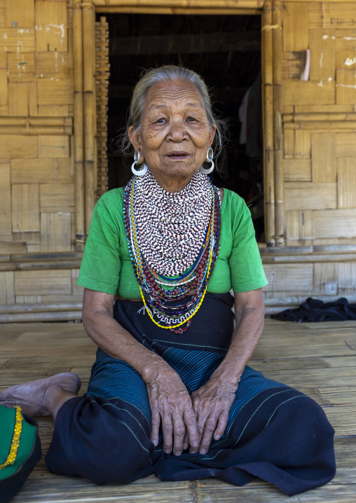 Portrait of a Tripura tribe woman with traditional necklaces and earrings, Chittagong Division, Rowangchhari, Bangladesh