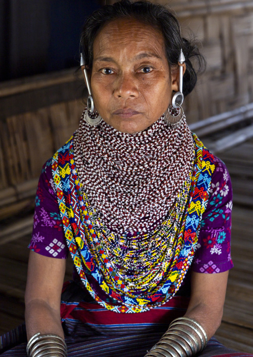 Portrait of a Tripura tribe woman with traditional necklaces and earrings, Chittagong Division, Rowangchhari, Bangladesh