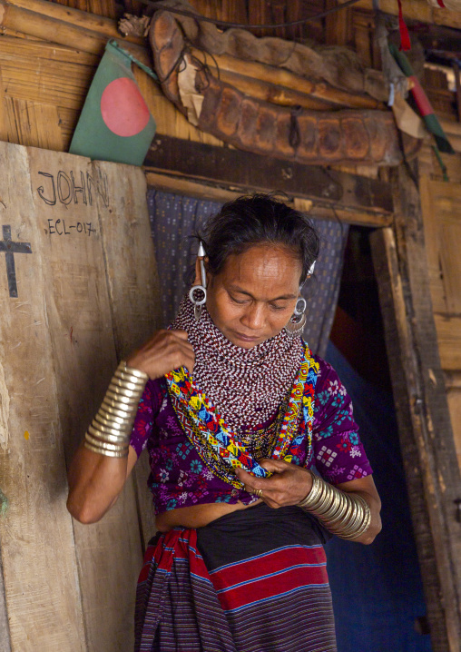 Tripura tribe woman with traditional necklaces and earrings, Chittagong Division, Rowangchhari, Bangladesh