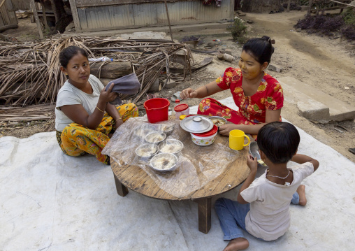 Marma people eating in a small street restaurant, Chittagong Division, Rowangchhari, Bangladesh