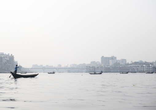 Bangladeshi people on canoes on Buriganga river, Dhaka Division, Keraniganj, Bangladesh
