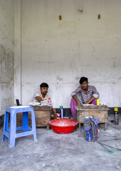 Metal worker using old lost wax casting method to create jewels, Dhaka Division, Dhamrai, Bangladesh