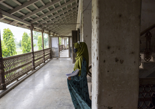Veiled women in an heritage house at Pakutia Zamindar Bari, Dhaka Division, Nagarpur, Bangladesh
