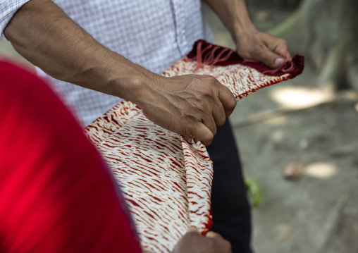 Shawl made with red tie-dye resist dyeing technique in Living Blue, Rangpur Division, Goalpara, Bangladesh