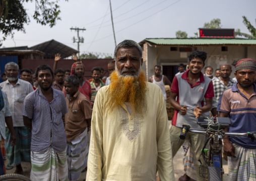 Bangladeshi eledery man with beard and hair dyed in henna, Rangpur Division, Rangpur, Bangladesh