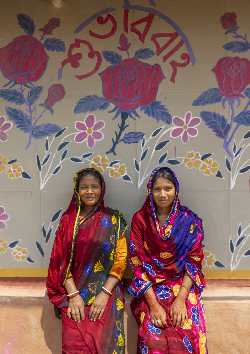 Newlywed christian woman from Santal group with her mother-in-law, Rajshahi Division, Tanore, Bangladesh