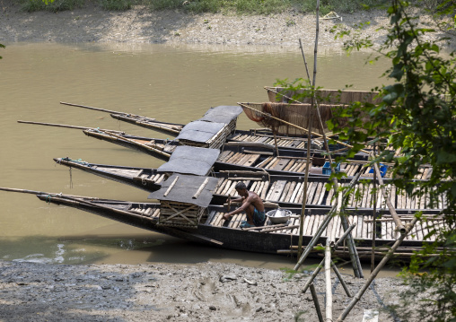 Bangladeshi fishermen use otters to fish in the Sundarbans, Khulna Division, Narail, Bangladesh