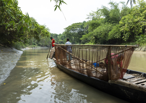 Bangladeshi fishermen use otters to fish in the Sundarbans, Khulna Division, Narail, Bangladesh