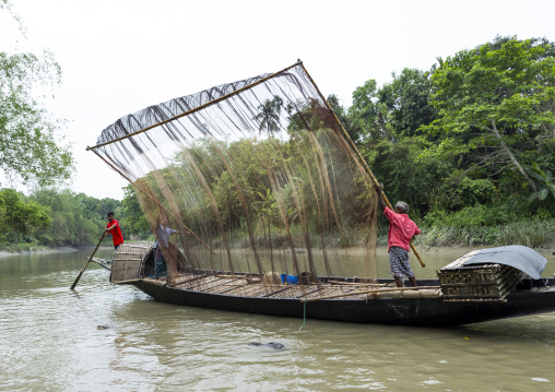Bangladeshi fishermen use otters to fish in the Sundarbans, Khulna Division, Narail, Bangladesh