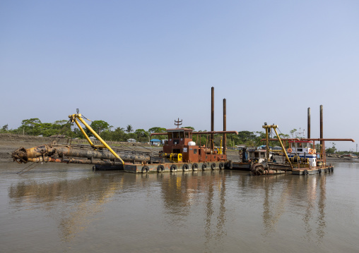 Dredger collecting sand in a river, Khulna Division, Mongla, Bangladesh