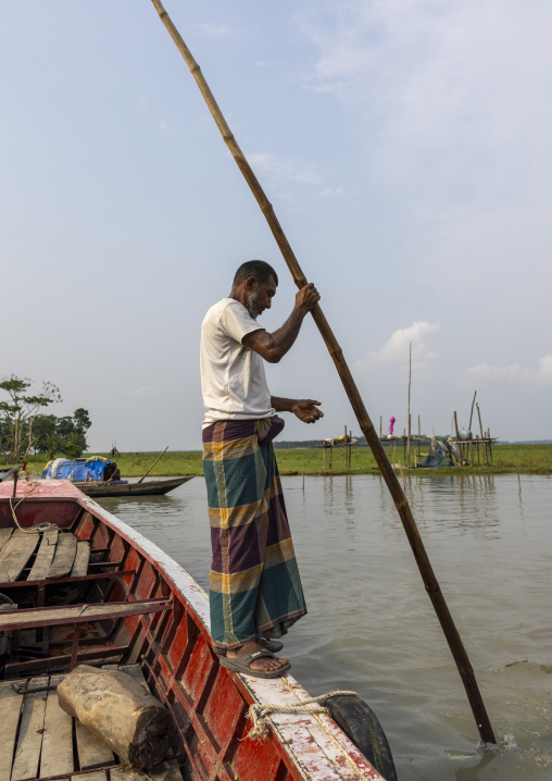 River gypsy man living on his boat on the river, Barisal Division, Barisal, Bangladesh