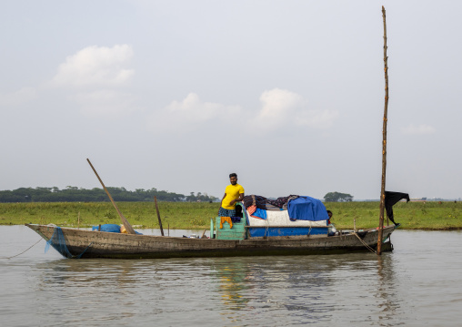 River gypsy man living on a boat , Barisal Division, Barisal, Bangladesh
