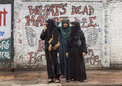 Bangladeshi women in hijabs in thes street, Dhaka Division, Dhaka, Bangladesh