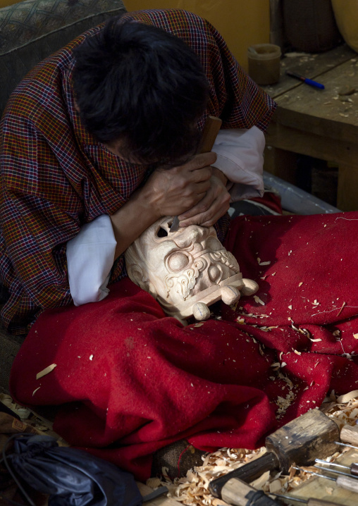 Bhutanese artist carving a wooden mask, Chang Gewog, Thimphu, Bhutan