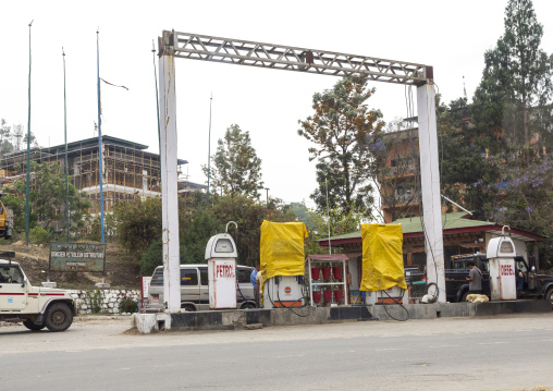 Cars filling gas at a gas station, Punakha dzongkhag, Punakha, Bhutan