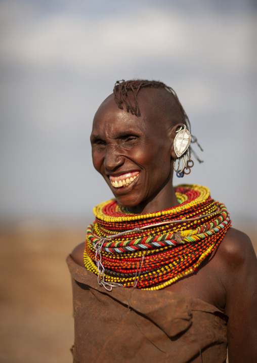 Turkana tribe woman with huge necklaces and earrings, Turkana lake, Loiyangalani, Kenya