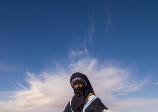 Portrait of a tuareg man against the sky, Tripolitania, Ghadames, Libya