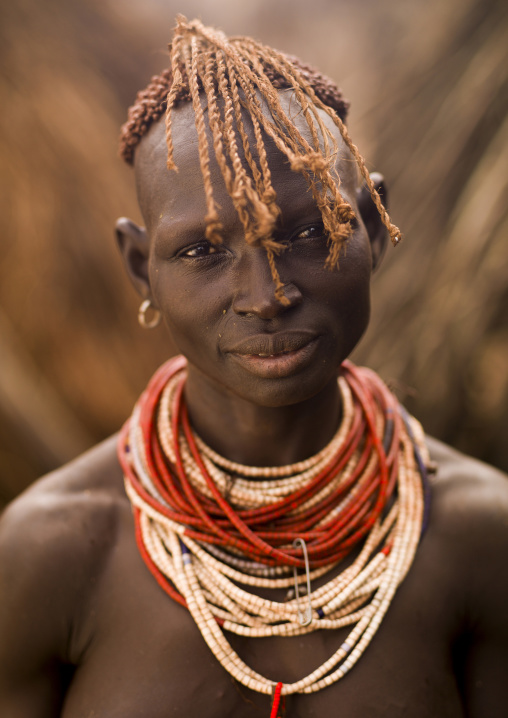 Karo tribe woman with traditional necklace and hairstyle, Korcho, Omo valley, Ethiopia