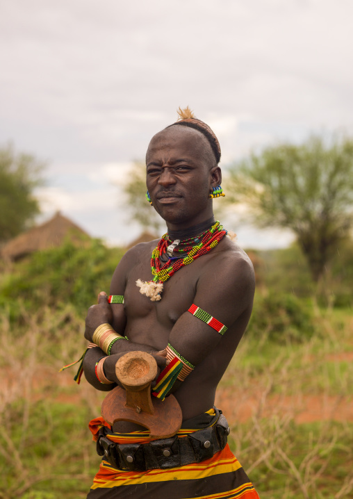 Portrait of bashada tribe man with his headrest, Omo valley, Turmi, Ethiopia