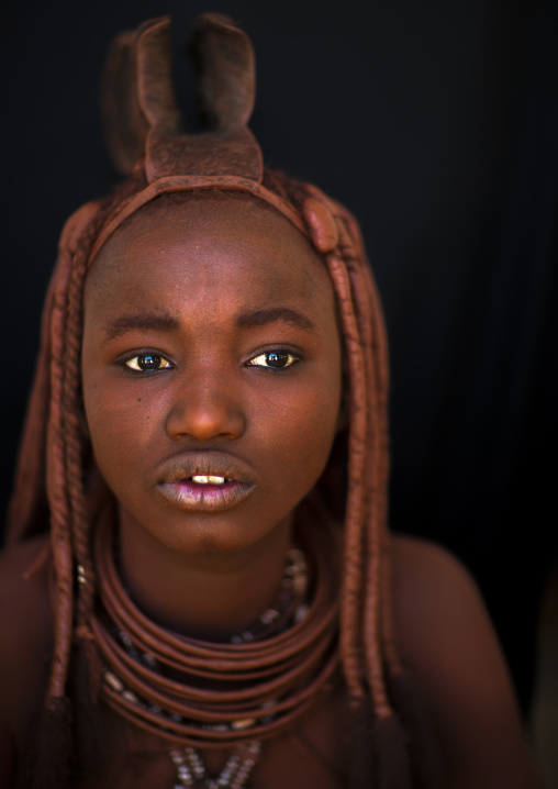 Portrait of a Himba tribe woman covered with otjize, Cunene province, Oncocua, Angola