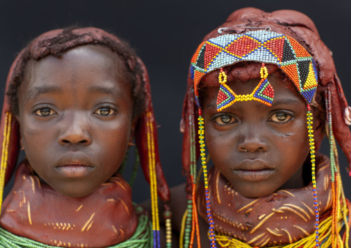 Mwila young girls with the vikeka mud necklace, Huila Province, Chibia, Angola