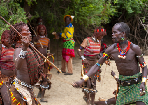 Whipping of a Hamer woman during bull leaping ceremony, Omo valley, Turmi, Ethiopia