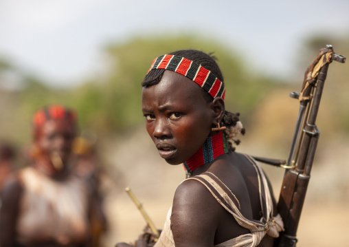 Hamer tribe woman with rifle, Omo valley, Turmi, Ethiopia